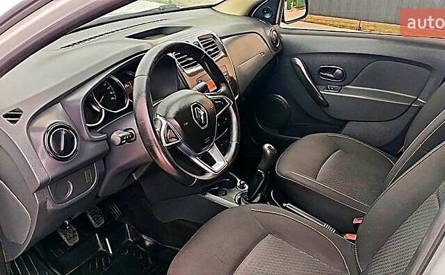 Белый Рено Логан, объемом двигателя 1 л и пробегом 128 тыс. км за 5200 $, фото 21 на Automoto.ua