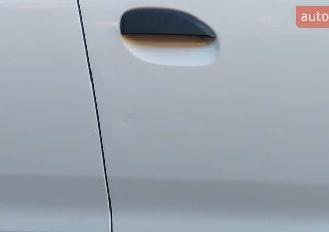 Белый Рено Логан, объемом двигателя 1 л и пробегом 388 тыс. км за 5000 $, фото 14 на Automoto.ua