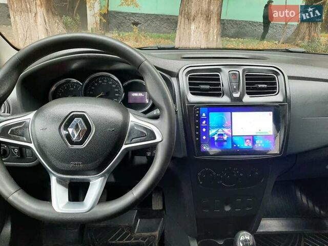 Белый Рено Логан, объемом двигателя 1 л и пробегом 140 тыс. км за 6000 $, фото 6 на Automoto.ua