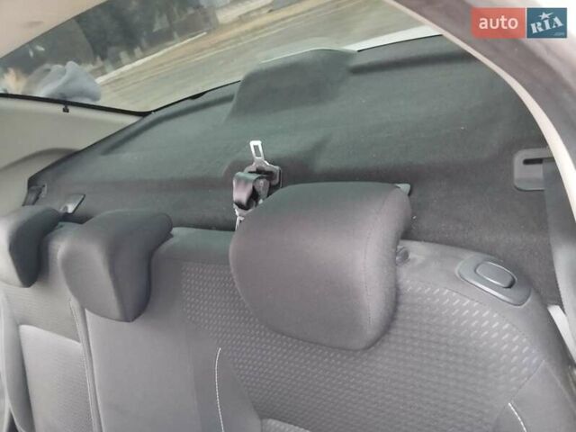 Білий Рено Логан, об'ємом двигуна 1.46 л та пробігом 124 тис. км за 8499 $, фото 14 на Automoto.ua