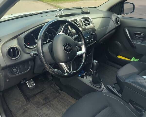 Білий Рено Логан, об'ємом двигуна 1 л та пробігом 150 тис. км за 5200 $, фото 8 на Automoto.ua