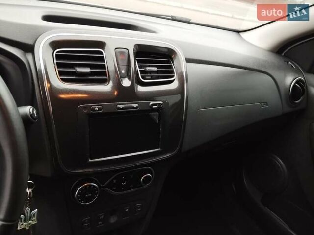 Білий Рено Логан, об'ємом двигуна 1.46 л та пробігом 124 тис. км за 8499 $, фото 17 на Automoto.ua