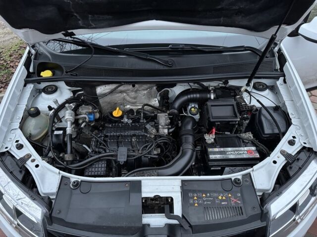 Білий Рено Логан, об'ємом двигуна 1 л та пробігом 130 тис. км за 4899 $, фото 14 на Automoto.ua