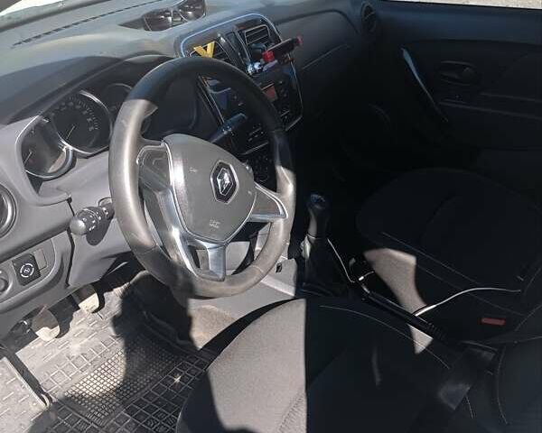 Білий Рено Логан, об'ємом двигуна 1 л та пробігом 220 тис. км за 4600 $, фото 5 на Automoto.ua