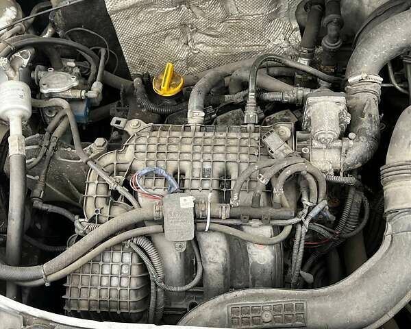 Білий Рено Логан, об'ємом двигуна 1 л та пробігом 394 тис. км за 3400 $, фото 1 на Automoto.ua