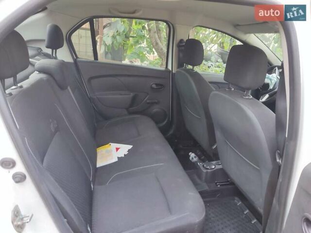 Білий Рено Логан, об'ємом двигуна 1.46 л та пробігом 118 тис. км за 3600 $, фото 9 на Automoto.ua