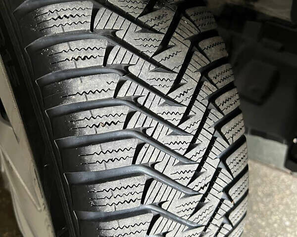 Белый Рено Логан, объемом двигателя 1 л и пробегом 177 тыс. км за 5699 $, фото 8 на Automoto.ua