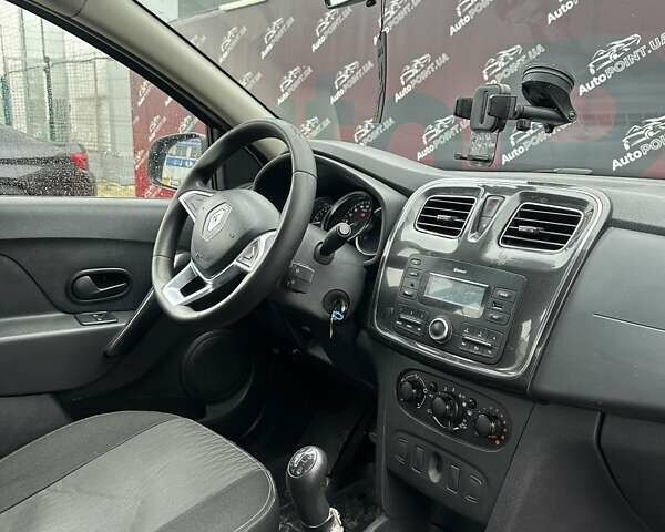 Белый Рено Логан, объемом двигателя 1 л и пробегом 194 тыс. км за 5500 $, фото 28 на Automoto.ua