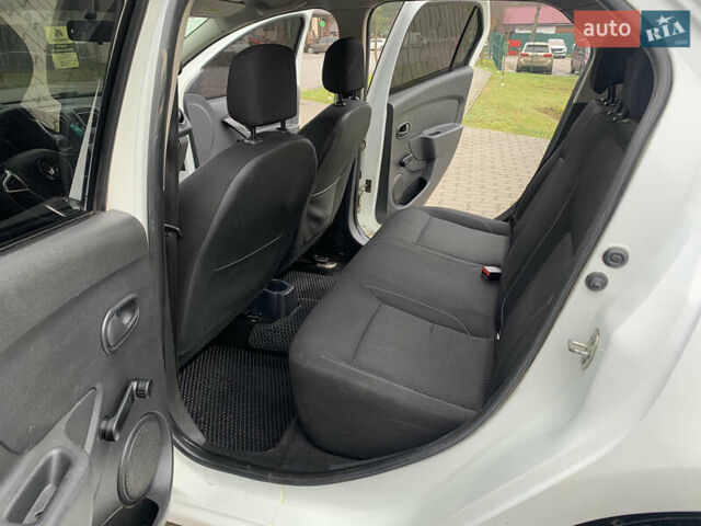 Белый Рено Логан, объемом двигателя 1 л и пробегом 280 тыс. км за 4999 $, фото 10 на Automoto.ua