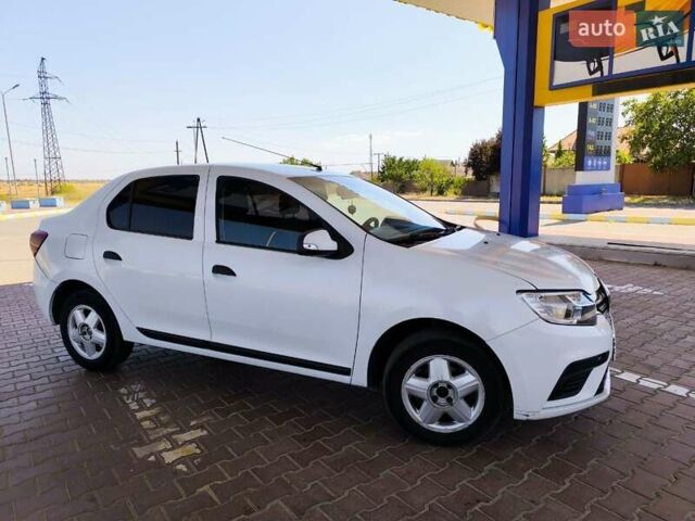 Белый Рено Логан, объемом двигателя 1 л и пробегом 258 тыс. км за 5300 $, фото 2 на Automoto.ua
