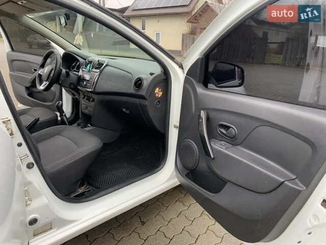 Белый Рено Логан, объемом двигателя 1 л и пробегом 280 тыс. км за 4999 $, фото 9 на Automoto.ua