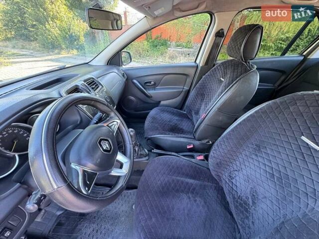 Белый Рено Логан, объемом двигателя 1 л и пробегом 267 тыс. км за 3999 $, фото 8 на Automoto.ua