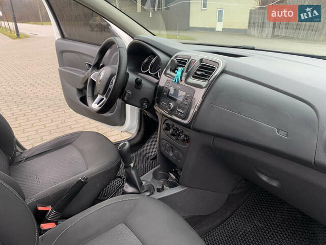 Белый Рено Логан, объемом двигателя 1 л и пробегом 280 тыс. км за 4999 $, фото 8 на Automoto.ua
