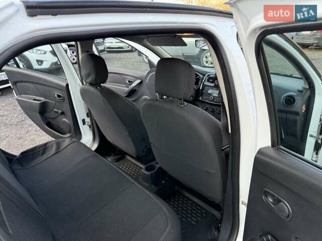 Рено Логан 2019 у Хмельницькому на Automoto.ua Білий Рено Логан, об'ємом двигуна 0.9 л та пробігом 86 тис. км за 5999 $, фото 31 на Automoto.ua