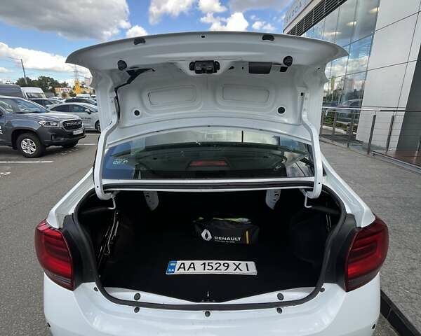 Білий Рено Логан, об'ємом двигуна 1 л та пробігом 103 тис. км за 7113 $, фото 10 на Automoto.ua