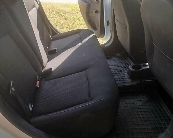 Белый Рено Логан, объемом двигателя 1 л и пробегом 175 тыс. км за 6900 $, фото 5 на Automoto.ua