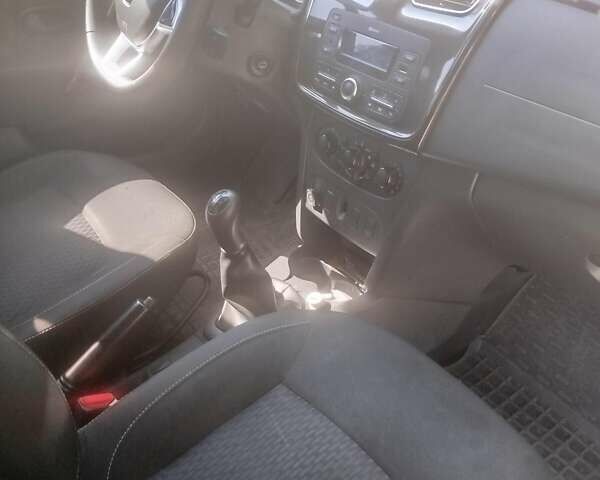 Белый Рено Логан, объемом двигателя 1 л и пробегом 175 тыс. км за 6900 $, фото 6 на Automoto.ua