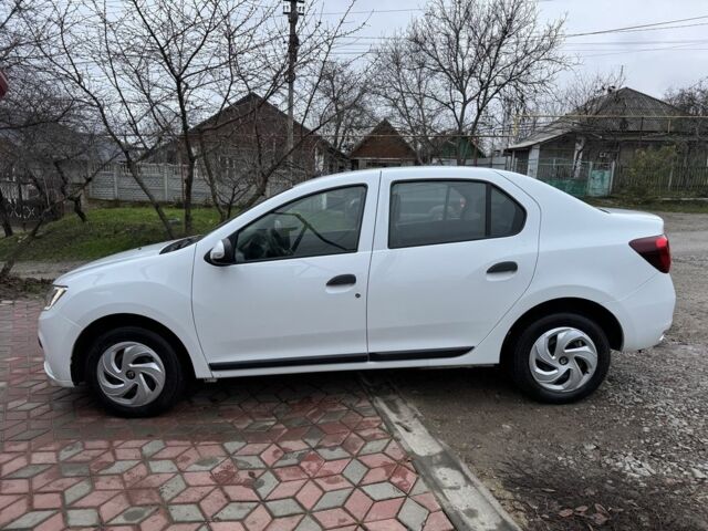 Білий Рено Логан, об'ємом двигуна 1 л та пробігом 130 тис. км за 4899 $, фото 1 на Automoto.ua