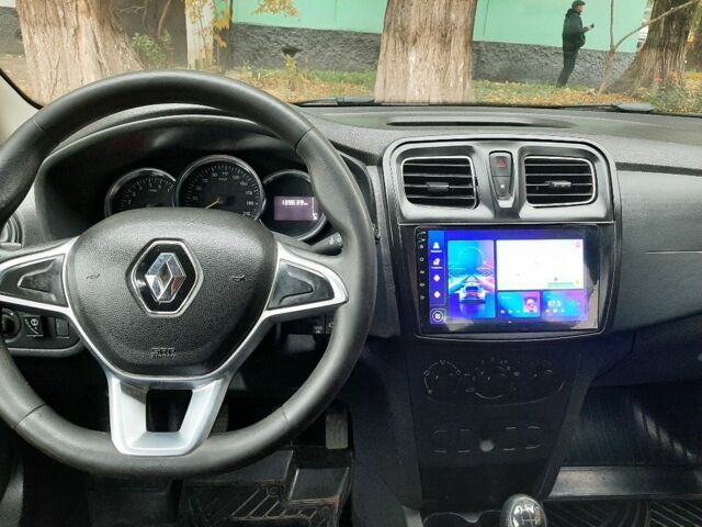 Белый Рено Логан, объемом двигателя 1 л и пробегом 140 тыс. км за 6200 $, фото 8 на Automoto.ua