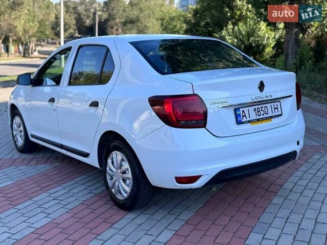 Белый Рено Логан, объемом двигателя 1 л и пробегом 267 тыс. км за 3999 $, фото 4 на Automoto.ua