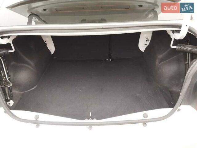 Білий Рено Логан, об'ємом двигуна 1.46 л та пробігом 124 тис. км за 8499 $, фото 25 на Automoto.ua