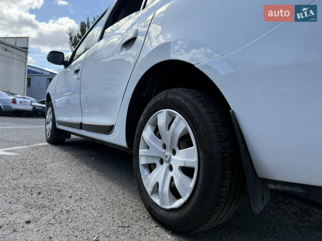 Білий Рено Логан, об'ємом двигуна 1.46 л та пробігом 203 тис. км за 7650 $, фото 7 на Automoto.ua