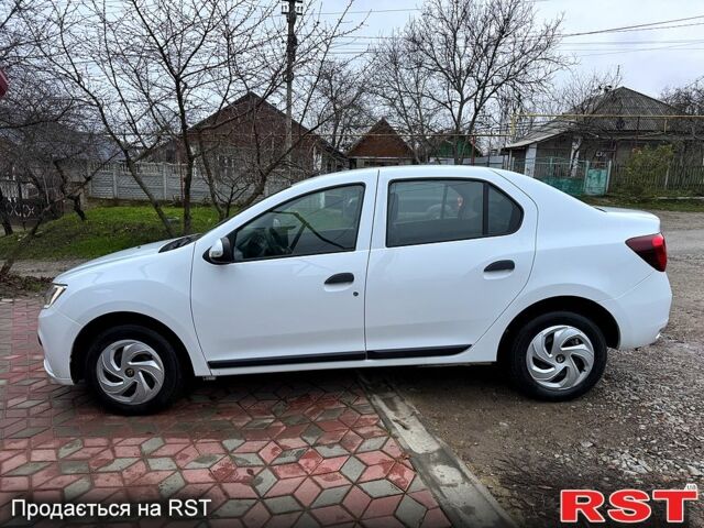 Білий Рено Логан, об'ємом двигуна 1 л та пробігом 130 тис. км за 4899 $, фото 1 на Automoto.ua