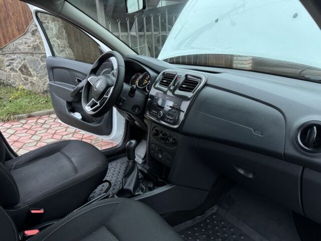 Білий Рено Логан, об'ємом двигуна 1 л та пробігом 130 тис. км за 4899 $, фото 11 на Automoto.ua