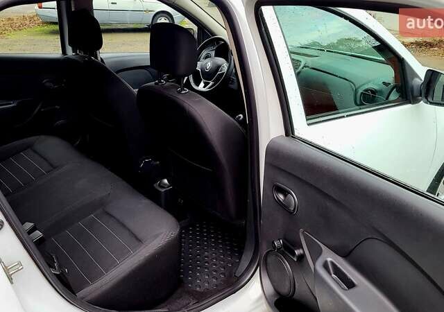 Білий Рено Логан, об'ємом двигуна 1.46 л та пробігом 80 тис. км за 8700 $, фото 19 на Automoto.ua