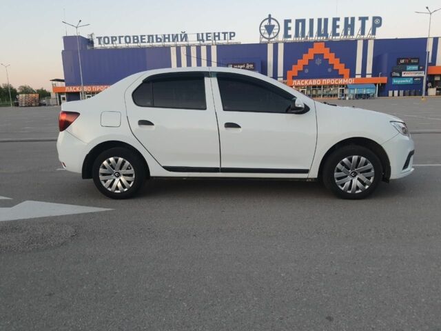Белый Рено Логан, объемом двигателя 1 л и пробегом 130 тыс. км за 6500 $, фото 4 на Automoto.ua