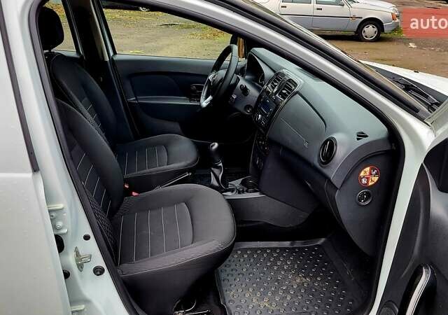 Білий Рено Логан, об'ємом двигуна 1.46 л та пробігом 80 тис. км за 8700 $, фото 25 на Automoto.ua