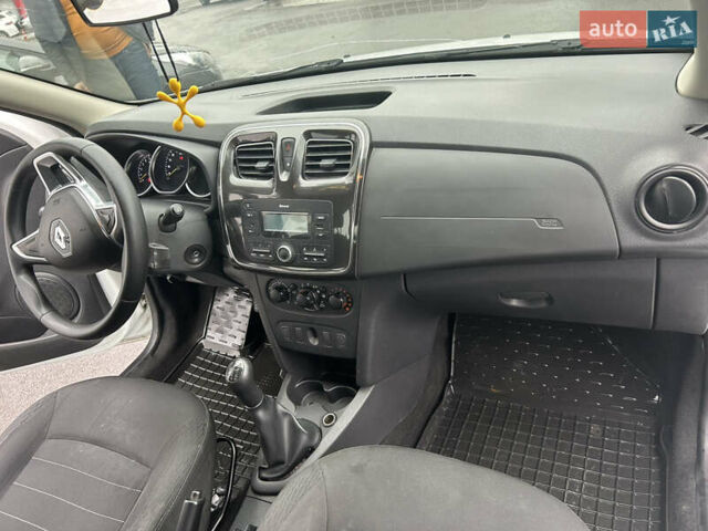 Белый Рено Логан, объемом двигателя 1 л и пробегом 275 тыс. км за 6800 $, фото 8 на Automoto.ua