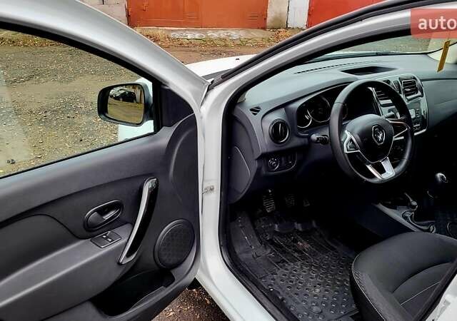 Білий Рено Логан, об'ємом двигуна 1.46 л та пробігом 80 тис. км за 8700 $, фото 17 на Automoto.ua