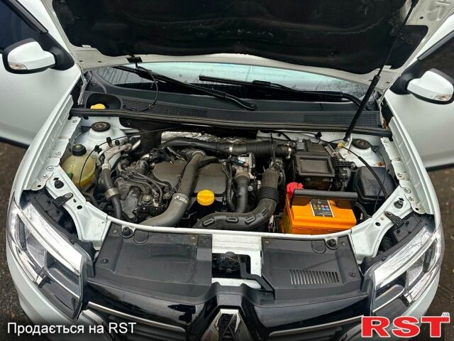 Белый Рено Логан, объемом двигателя 1.5 л и пробегом 152 тыс. км за 7500 $, фото 4 на Automoto.ua