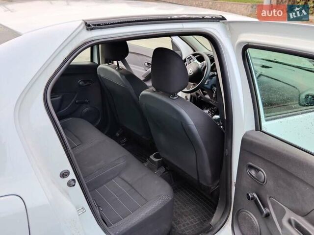 Белый Рено Логан, объемом двигателя 0.9 л и пробегом 89 тыс. км за 8500 $, фото 16 на Automoto.ua