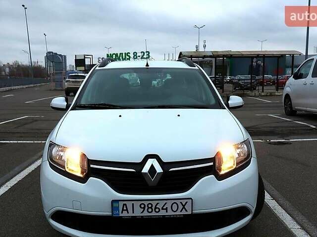 Білий Рено Логан, об'ємом двигуна 1.1 л та пробігом 205 тис. км за 6500 $, фото 4 на Automoto.ua