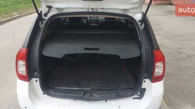 Белый Рено Логан, объемом двигателя 1.46 л и пробегом 226 тыс. км за 5900 $, фото 8 на Automoto.ua