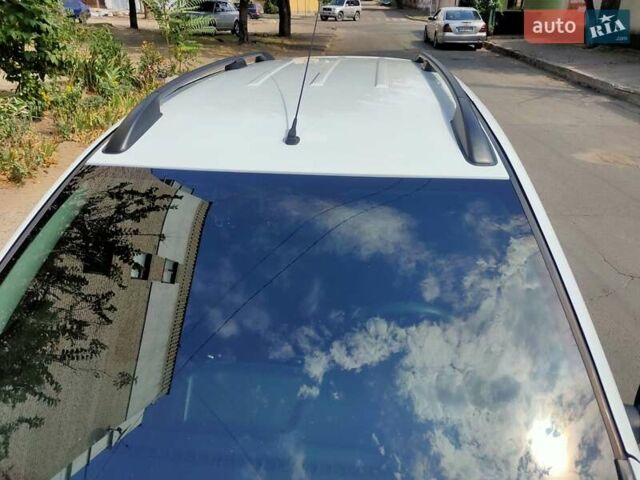 Белый Рено Логан, объемом двигателя 1.46 л и пробегом 178 тыс. км за 8700 $, фото 2 на Automoto.ua