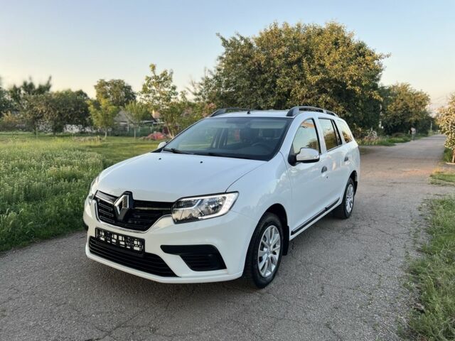 Білий Рено Логан, об'ємом двигуна 1.5 л та пробігом 56 тис. км за 9980 $, фото 1 на Automoto.ua