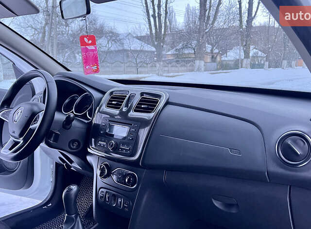 Белый Рено Логан, объемом двигателя 1.46 л и пробегом 70 тыс. км за 10800 $, фото 13 на Automoto.ua