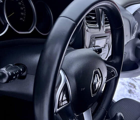 Білий Рено Логан, об'ємом двигуна 1.46 л та пробігом 70 тис. км за 10500 $, фото 30 на Automoto.ua