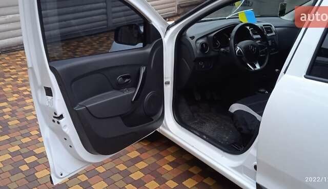 Білий Рено Логан, об'ємом двигуна 1.5 л та пробігом 60 тис. км за 12500 $, фото 11 на Automoto.ua