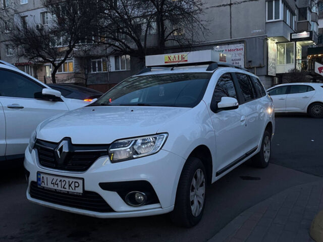 Білий Рено Логан, об'ємом двигуна 1.46 л та пробігом 167 тис. км за 11000 $, фото 4 на Automoto.ua