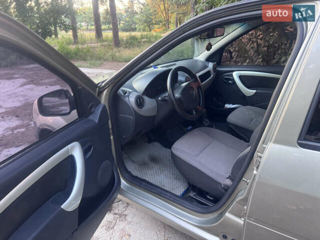 Бежевий Рено Логан, об'ємом двигуна 1.39 л та пробігом 277 тис. км за 3300 $, фото 19 на Automoto.ua