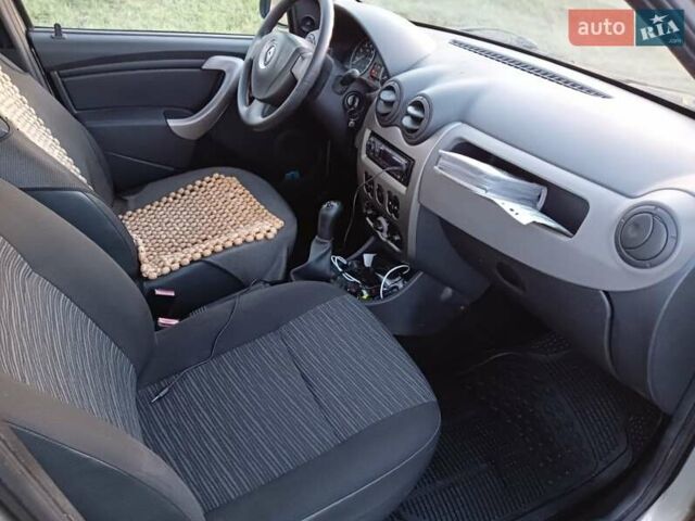 Бежевый Рено Логан, объемом двигателя 1.39 л и пробегом 175 тыс. км за 4999 $, фото 26 на Automoto.ua