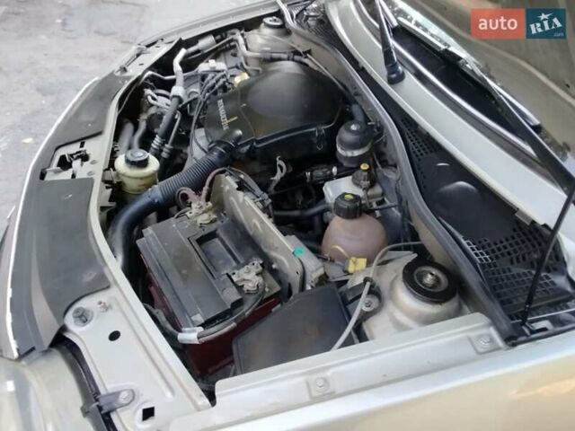 Бежевый Рено Логан, объемом двигателя 1.4 л и пробегом 241 тыс. км за 4600 $, фото 12 на Automoto.ua