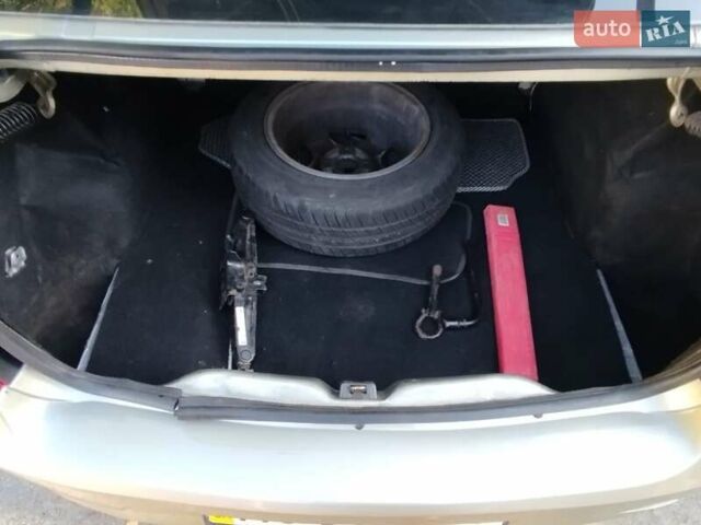 Бежевый Рено Логан, объемом двигателя 1.4 л и пробегом 241 тыс. км за 4600 $, фото 11 на Automoto.ua