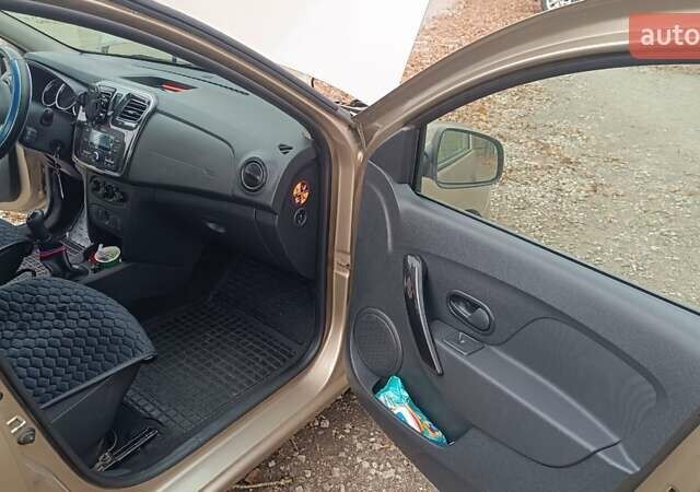 Бежевий Рено Логан, об'ємом двигуна 1.46 л та пробігом 72 тис. км за 12000 $, фото 5 на Automoto.ua