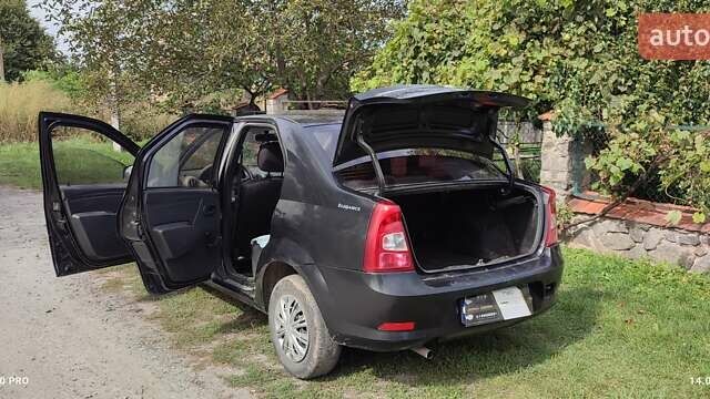 Черный Рено Логан, объемом двигателя 1.4 л и пробегом 154 тыс. км за 4600 $, фото 3 на Automoto.ua