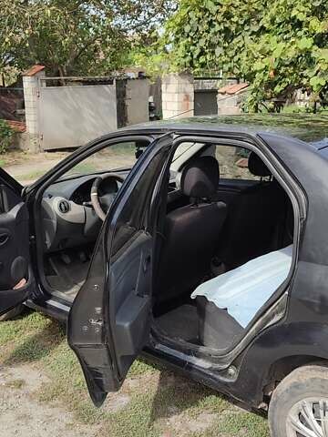 Черный Рено Логан, объемом двигателя 1.4 л и пробегом 154 тыс. км за 4600 $, фото 4 на Automoto.ua